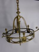 An Antique Regency Style Light Fitting, the light fitting having lion mask head and beaded