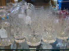 A Quantity of Glass, including six highball, a water jug, five tumblers and two decanters. (14)