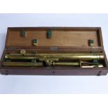 A Brass Library Telescope, in fitted mahogany case.