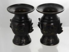 A Pair of Antique Japanese Bronzed Vases, the vases having ducks and fish to centre cartouche on