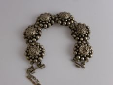 A Lady's Indian Silver Floral Bracelet, approx wt 38 gms.