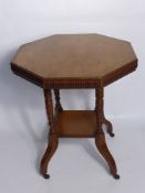 An Octagonal Table on Casters, the table having decorative edge.