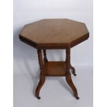 An Octagonal Table on Casters, the table having decorative edge.