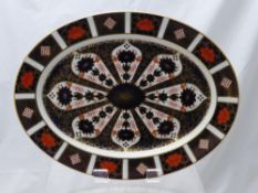 Two Royal Crown Derby Imari Oval Platters, pattern no. 1128, approx 41 and 34 cms respectively.