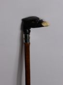 A Bamboo Shafted Walking Stick, with raptor's head knop (with ivory beak) and silver band (London