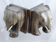 A Pair of Rosewood Elephant Book Ends, together with an elephant base and carved coconut trinket