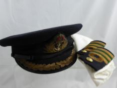 A Collection Comprising, Naval cap, epaulettes, Bosun's cap and possibly Commander's stripes.