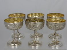 Six Antique Chinese Sterling Silver Champagne Goblets, two embossed with bamboo, two with water lily