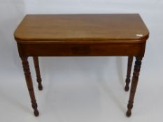 An Antique Mahogany Swivel Top Tea Table on turned legs, approx 91 x 89 x 74 cms.