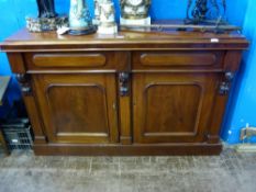 A Victorian Mahogany Sideboard, two drawers and two cupboards beneath, approx 130 x 46 x 90 cms.