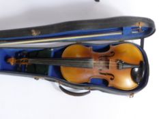 A Cased Violin, allegedly used to play with Ramon Leppard.