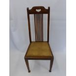 Six Oak Arts & Crafts Straight Back Chairs, with leather seating. (6)