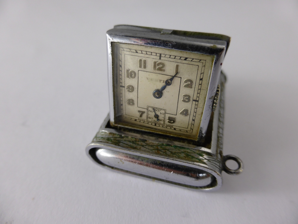 A Stainless Steel Vertex Mechanical Vintage Swiss Traveller's Watch.