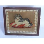 An Antique Tapestry depicting a King Charles Spaniel, approx 54 x 44 cms.