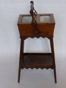 A 19th Century Rosewood Lady's Work Box, with box wood inlay, two glazed doors with fitted silk