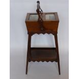 A 19th Century Rosewood Lady's Work Box, with box wood inlay, two glazed doors with fitted silk