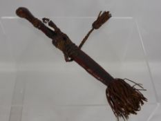 A North African Dagger, with decorative tooled and braided leather scabbard and hilt, approx 30