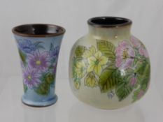 A Chelsea Pottery Vase, hand painted with flowers together with a small Chelsea Pottery Vase (2)