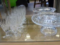 Six Waterford Crystal Champagne Flutes, in original boxes together with a Waterford Crystal Cake