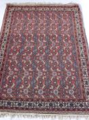 An Oriental Hall Rug, with floral geometric design, approx 106 x 156 cms