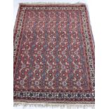 An Oriental Hall Rug, with floral geometric design, approx 106 x 156 cms