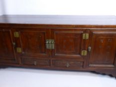 A Circa 1900 Chinese Fruit Wood Sideboard, the sideboard having cupboards to either side with