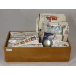 A Wooden Box of GB Commemorative Covers, together with a small amount of unused material and all-