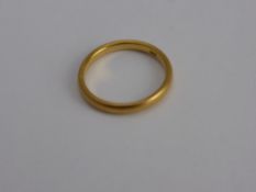 A Yellow Gold 22 ct Wedding Ring, Sheffield hallmark, mm AC Co., size M, approx wt 2.9 gms.