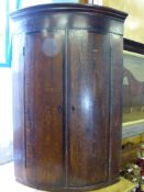 A Georgian Mahogany Corner Cupboard, with two internal shelves, approx 68 x 100 cms