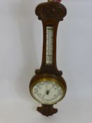 An Antique Oak Banjo Barometer, by E. Holmes (WAF).