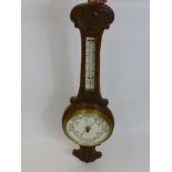 An Antique Oak Banjo Barometer, by E. Holmes (WAF).