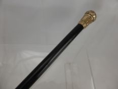 A Victorian Ebony and White Metal Fancy Top Walking Cane.