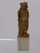 A Chinese Soap Stone Seal - the seal depicting a wise man.