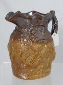 An Early 19th Century Doulton & Watts Lambeth Pottery Hare Jug, the treacle and brown glaze jug