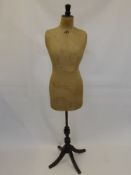 A Vintage Canvas Covered Tailor's Lady's Dummy, length of body approx 86 cms on wooden stand, size