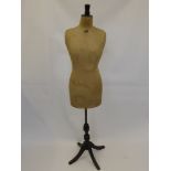 A Vintage Canvas Covered Tailor's Lady's Dummy, length of body approx 86 cms on wooden stand, size