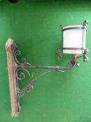 Seven Decorative Wrought Iron Exterior Wall Lights, some with original glass shades.