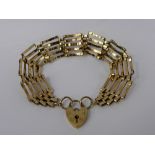 A Lady's 9 Ct Gold 375 Hallmark Gate Link Bracelet, with heart shaped clasp (WF), approx 12 gms.