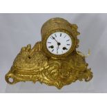 A Victorian Brass Mantel Clock, the clock depicting birds on a branch. WF.