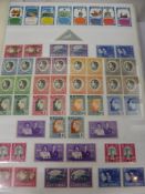 A Stamp Album Containing Miscellaneous Mint GB QV - QE II  British Colonies and Commonwealth