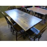 A Stagg Kitchen Table approx 150 x 56 cms with six matching wheelback chairs.