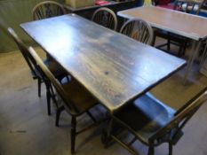 A Stagg Kitchen Table approx 150 x 56 cms with six matching wheelback chairs.