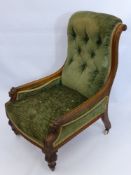 An Edwardian Button Back Mahogany Lounge Chair, the chair having lion mask carving to arms.
