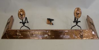 A Copper Arts and Crafts Fender depicting owls together with two companion coal tongs.