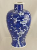 A  Chinese Blue and White Baluster Vase with Prunus design Approx 30cm