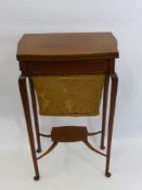 An Antique Mahogany Swivel Top Sewing Box / table.