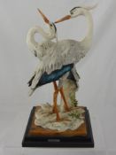 A Resin Italian Figurine of Herons by G. Armani, approx 34 cms