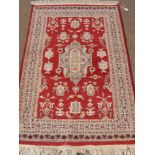 Two Middle Eastern Woollen Prayer Rugs, 1 blue approx 90 x 63 cms, the other red.approx 124 c 81