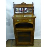 An Antique Rosewood Music Cabinet, having inlaid front with mirrored back and glazed cupboard front,