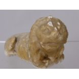 An Antique Marble Figure of a Lion, approx 12 x 6 cms.